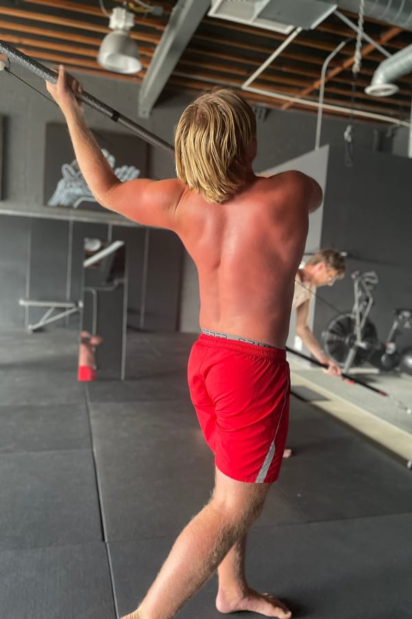 Trainer working with a client